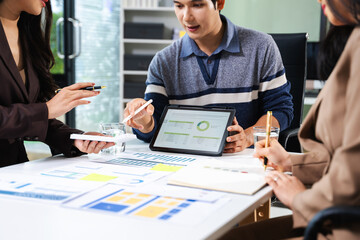 Smart team analyzing financial data with digital reports and charts. Concept of business strategy,...