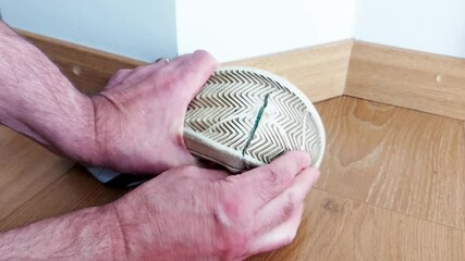 Worn-out sneaker soles reveal deep cracks as skilled hands prepare careful restoration. Watch precise repair techniques bring durability back to favorite footwear