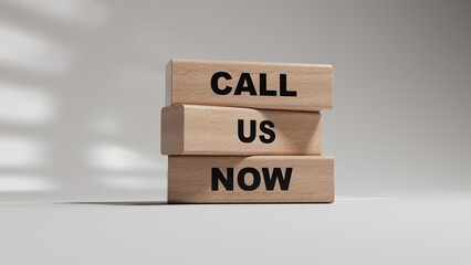 Call us now symbol. wooden blocks with words Call us now.Business and Call us now concept. Copy space.3D rendering on white background.
