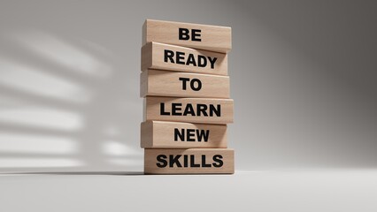 Learn new skills symbol. Concept words Be ready to Learn new skills on wooden blocks.Business and Learn new skills concept. Copy space.3D rendering on white background.