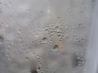 Water drops on a plastic coffee cup