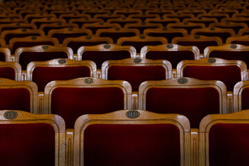 Row of red seats in theatre