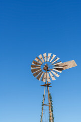Old windmill on a day against blue sky near Warooka, Yorke Peninsula, South Australia