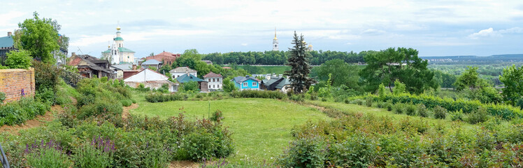 Panorama of an old small town on a hill.
