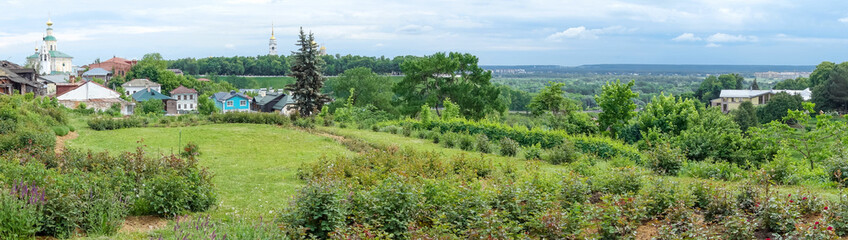 Panorama of an old small town on a hill.
