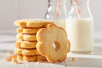 Crunchy and tasty butter cookies served with milk in bottle.