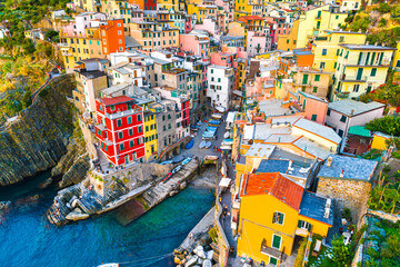 Riomaggiore of Cinque Terre, Italy - Traditional fishing village in La Spezia, situate in coastline of Liguria of Italy. Riomaggiore is one of the five Cinque Terre travel attractions.