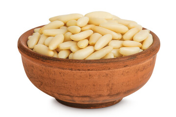 Shelled European pine nuts in ceramic bowl isolated on white background with full depth of field