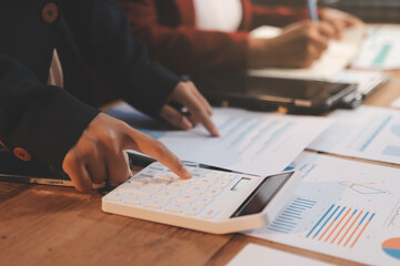 Business meeting time. Business man and business woman working on startup project.