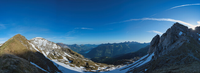 large panorama towards Altdorf in Switzerland in the Alps in spring with beautiful weather and blue sky