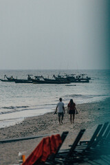 man and woman on the beach
