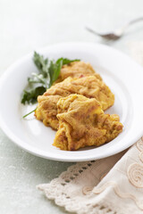 Pork Schnitzel on wooden background. Close up. 