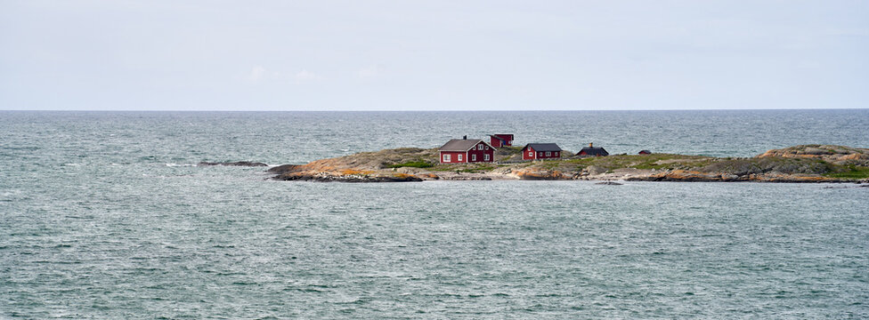  Scenic Red Wooden Houses by the Sea in Varberg, Sweden