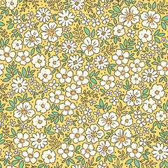 Retro floral pattern in small decorative flowers. Small white flowers. Green leaves. Light yellow background. Ditsy print. Floral seamless background ditsy pattern in small cute spring flowers.