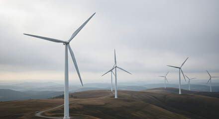 Wind Turbines on a Hilltop Generating Renewable Energy on Overcast Day