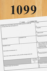 Obraz premium Federal tax 1099 form on a wood desk