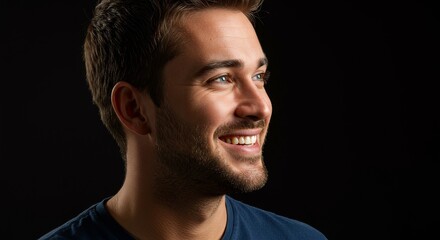 Fototapeta premium Photo of Smiling Handsome Man Portrait Isolated on Dark Background
