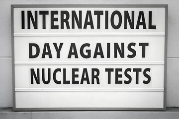 Obraz premium International Day Against Nuclear Tests on Lightbox: Message for Peace, Disarmament, Anti-War. Global Awareness Campaign.generative ai