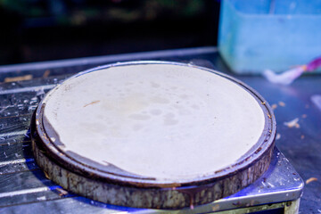 The process of making crispy crepes filled with various different fillings at food bazaar