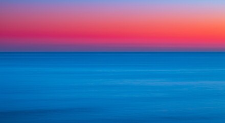 Fototapeta premium Scenic Ocean Sunset with Blue Water and Pink Sky Natural Seascape