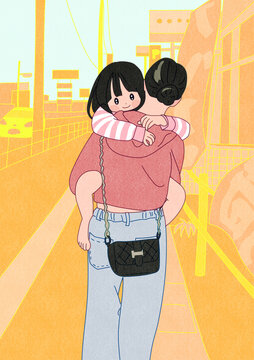 おねえちゃんに抱っこしてもらってるこども