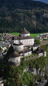 Aerial view of Kufstein town with medieval Castle fortress in Tyrol, Austria, Alps mountains. Vertical video