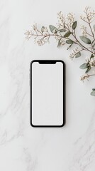 Blank Smartphone Screen Mockup with White Flowers and Greenery on a Textured White Background