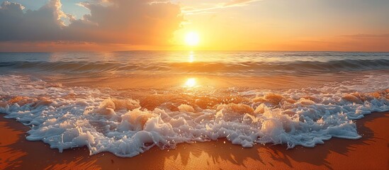 A serene sunrise over tranquil ocean waves crashing on a sandy beach, with vibrant colors enhancing the scenery.