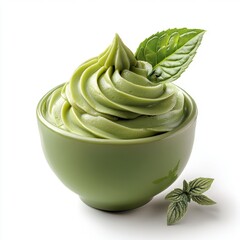 Smooth creamy green matcha flavored ice cream or frozen yogurt swirl in a light green bowl garnished with fresh mint leaves on a white background