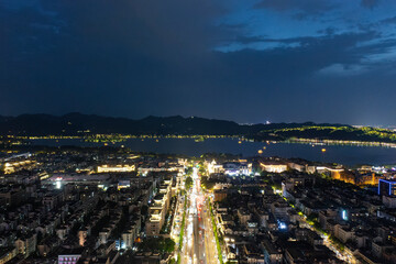 Fototapeta premium ​​Aerial view of night skyline West Lake in Hangzhou 