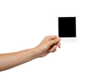 A hand holds a polaroid blank picture, isolated on white or transparent background. PNG
