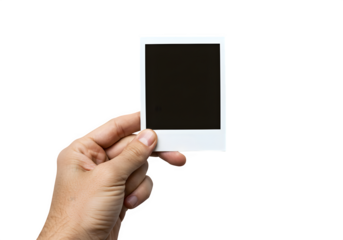 A hand holds a polaroid blank picture, isolated on white or transparent background. PNG
