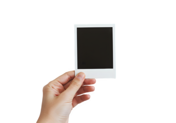 A hand holds a polaroid blank picture, isolated on white or transparent background. PNG