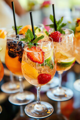 Close-up shot of fancy cocktails with fruits.