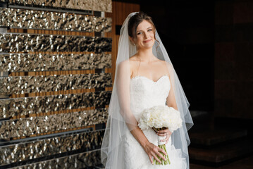 bride in a white dress at the training camp