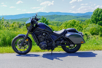Vintage chopper motorcycle roadtrip in summer day. Custom style.