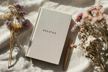 Wellness Journal Flat Lay with Calming Text 'BREATHE'