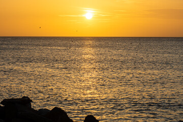 Sunset in front of the sea in Juan Griego, Venezuela