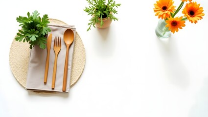 Elegant table setting with wooden cutlery and flowers