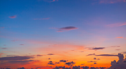 Colorful sky backdrop in the morning,Nature beautiful Light Sunset or sunrise sky,Sunset Sky Background in the Evening with Dramatic Dusk Clouds and Colorful Pink, Orange Sunlight on Blue Twilight sky