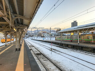 Fototapeta premium Winter Train Station at Sunrise