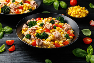 Tuna corn pasta salad with tomatoes and broccoli