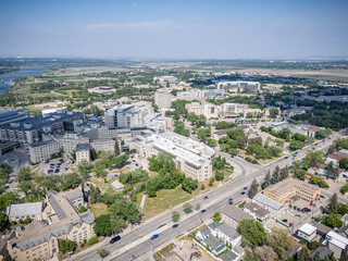 City view from above with a lot of buildings and a river