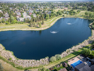 Large body of water with a green grassy area surrounding it