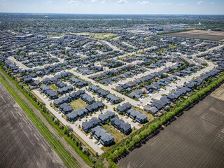 Large residential area with many houses and a few trees