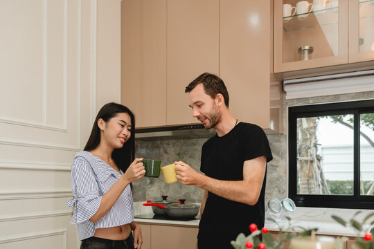 Couple lovers sharing morning beverages drinking coffee or tea moment happy time emphasizing connection, comfort, and shared routines family.
