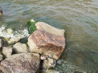Rocks in water with gentle waves
