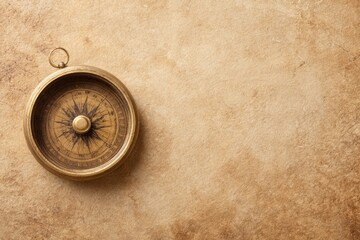 vintage compass on old map surface with ample copy space on right suggesting exploration theme minimalist composition