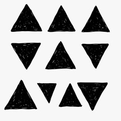 A set of hand-drawn triangles a brush and doodle sketch style.