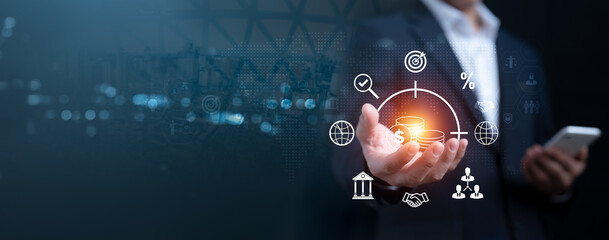 Financial growth and investment strategy for global business success. Hand holding digital coin icons with business and finance symbols for future development.